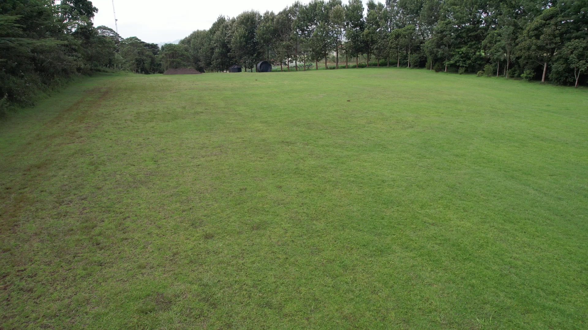 The bare football pitch before planting